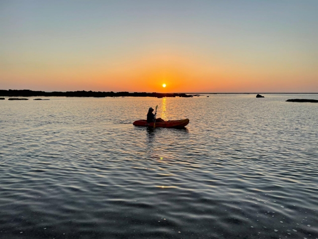 Kayak bei Sonnenuntergang