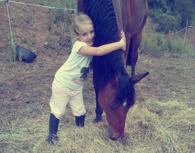 Niña con caballo