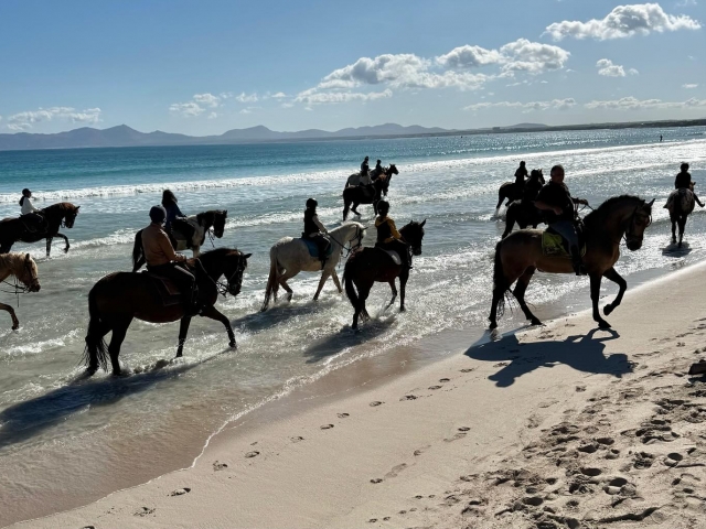  a cavalo na praia 