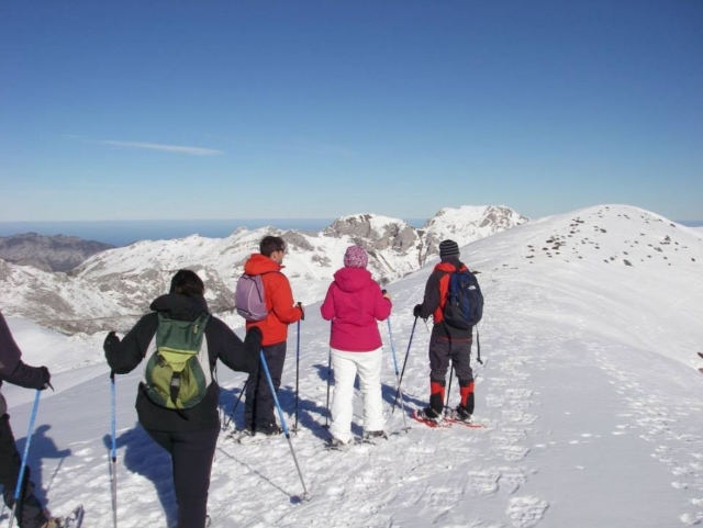 Viendo la nieve en las cumbres