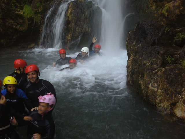  Group posing in front of the waterfall 