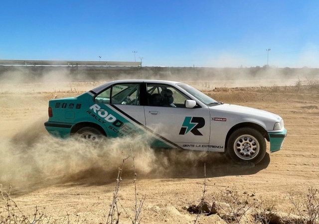  Rear-wheel drive BMW on a dirt circuit 