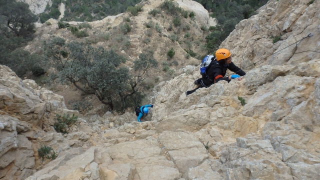  Clinging to the rock walls of the route 