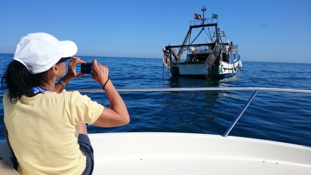  fotografar a pesca O arco curtindo a costa
