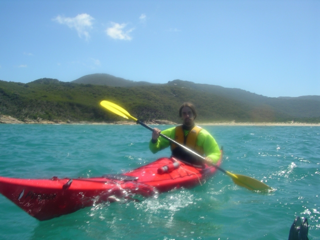  Boy equipped to navigate a kayak