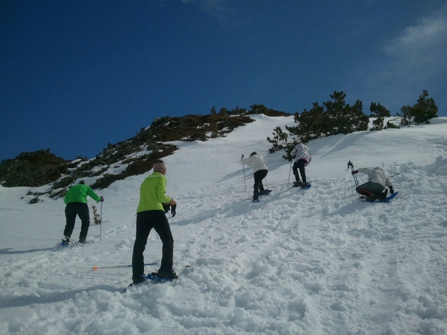  Climbing the slope with snowshoes 