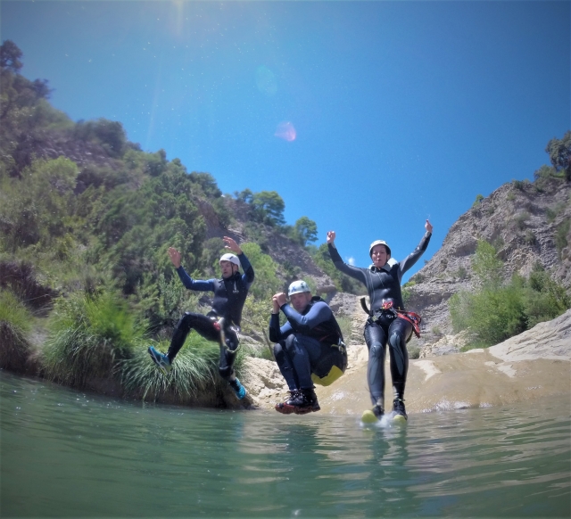  With friends practicing canyoning 