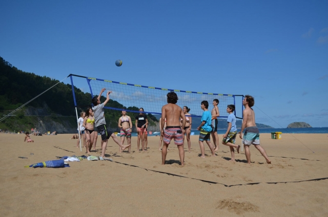  Playing beach volleyball 