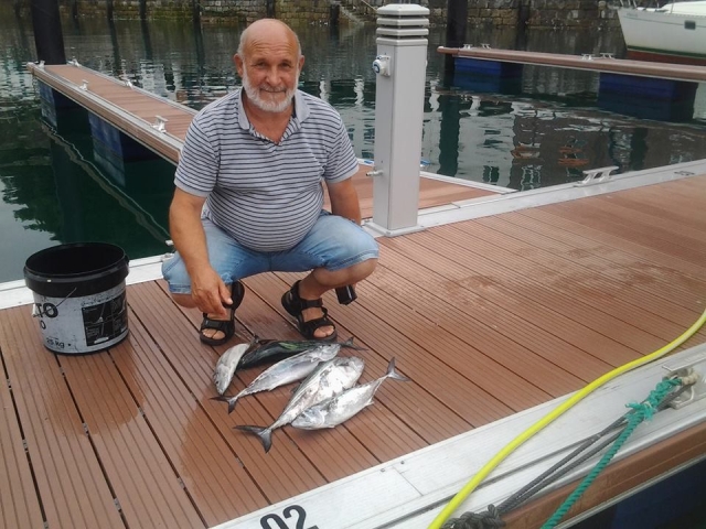 Con la pesca en el muelle