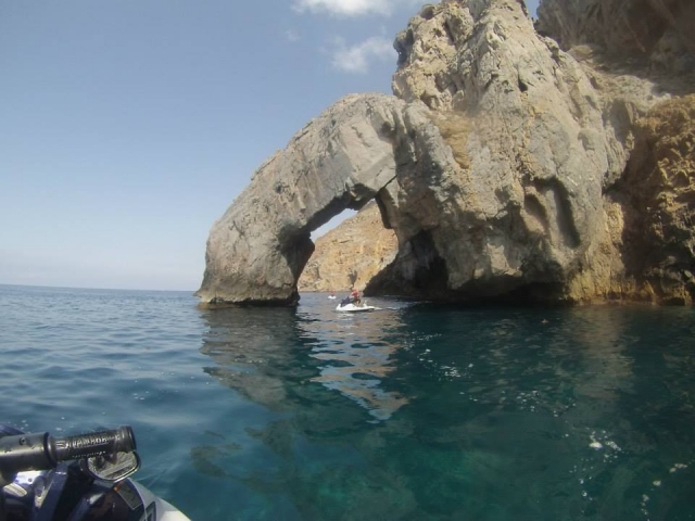 Passing through the rocks on the motorcycle 