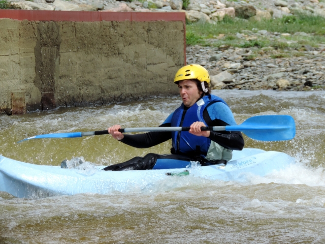 man in the blue kayak 
