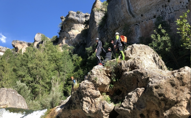  Climbing a rock from the Jucar ravine