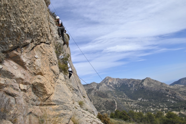  Rock wall climbing 