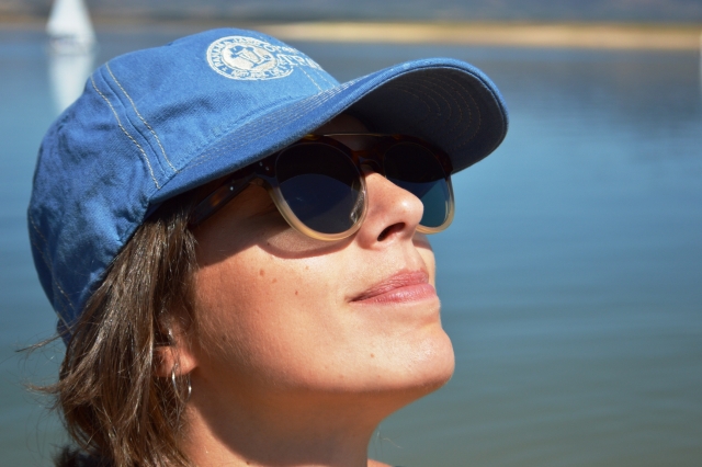  Protecting themselves from the sun with glasses and a cap 
