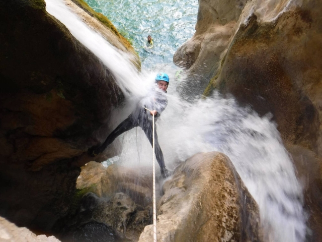  Rappelling under the strong waterfall in Rio Verde 
