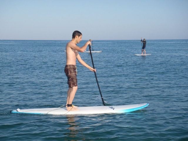 Paddle surf