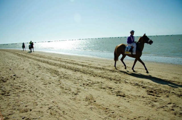 Después de la carrera toca disfrutar de un tranquilo paseo por la playa