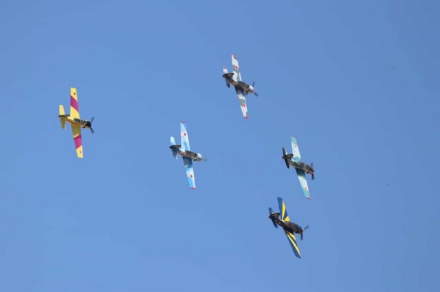  Small planes flying in unison 