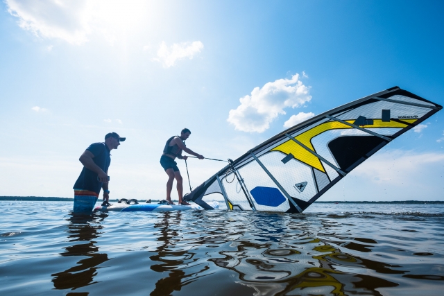  Next to the windsurf instructor 