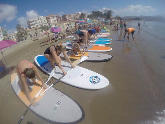  Praticare paddle surf nella sabbia 