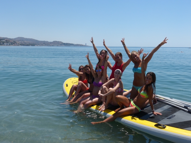  Waving from the big SUP board 