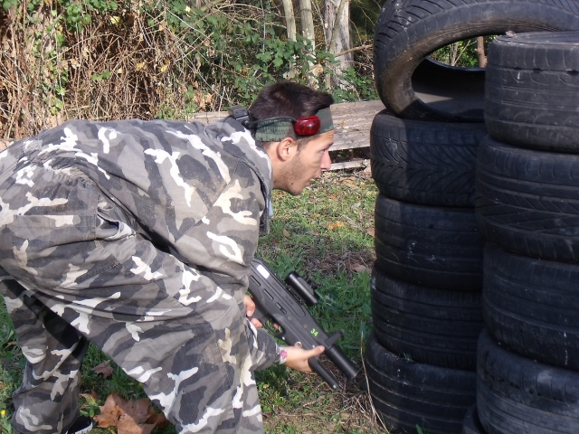  Hidden behind tires 