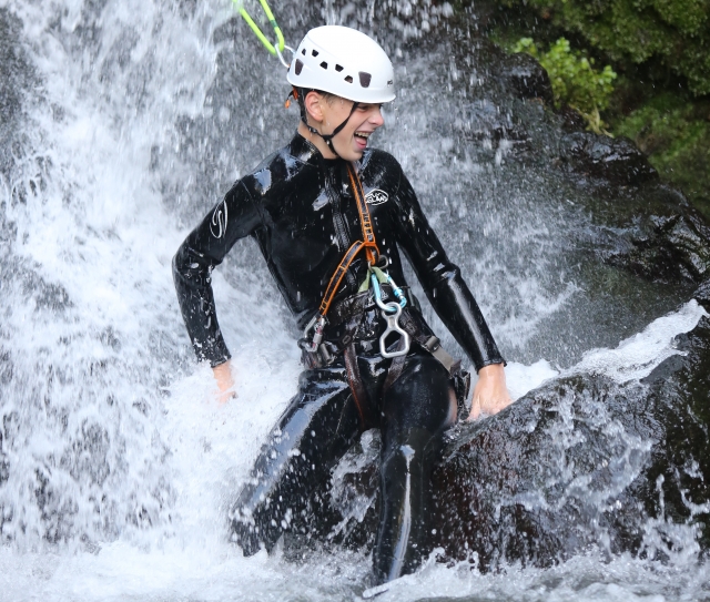  Young man doing canyoning 
