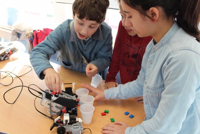  The children have a great time trying the different assemblies of the multirobot