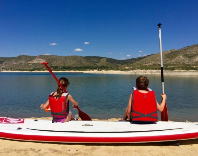  Little ones sitting on the sup board 