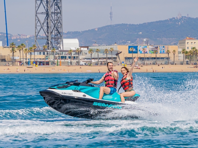  Having fun riding a jet ski 