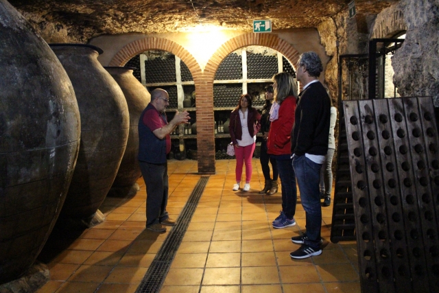  Serving among the wine vats 