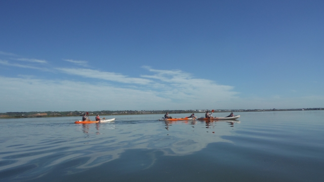  Kayaks moving away