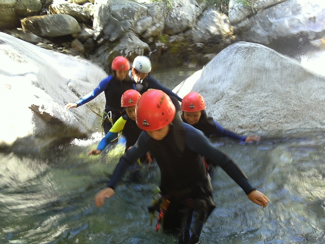  Family crossing the stream 