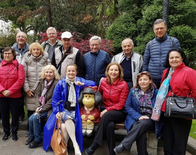  Group of curious people enjoying Oviedo 