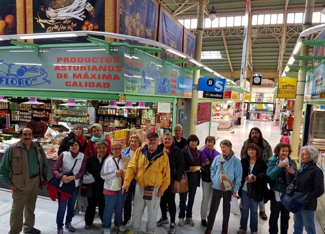  Group of tourists enjoying Oviedo 