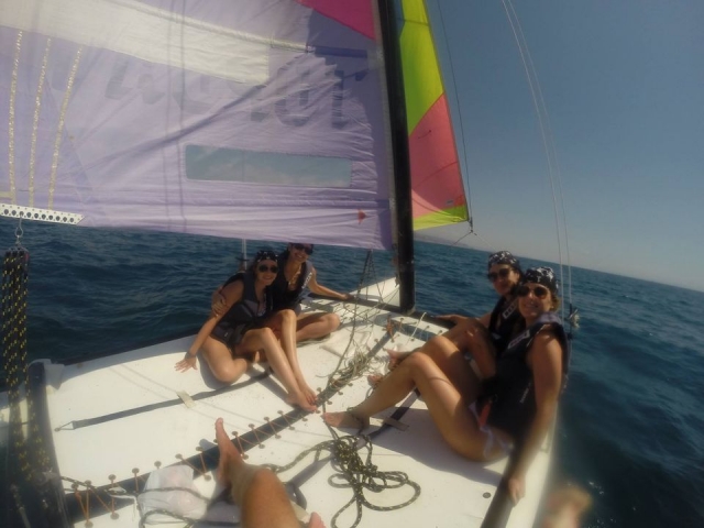 Friends on board the catamaran 