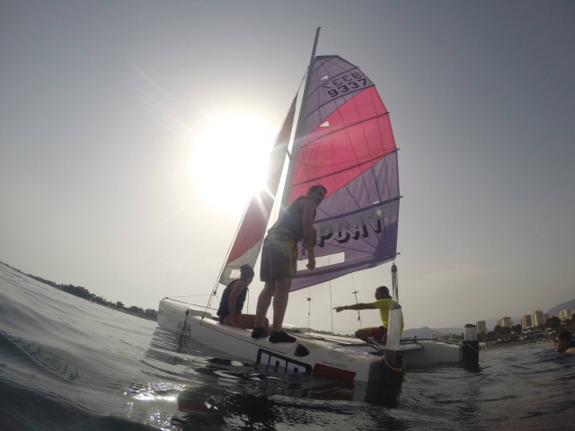  On the catamaran with the skipper 