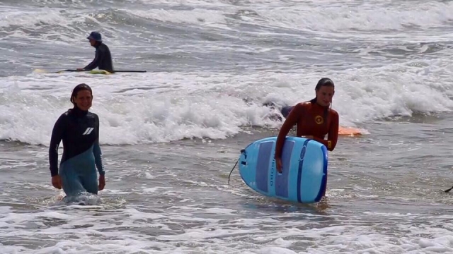  Ragazzo con la tavola da surf