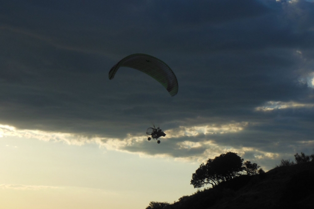  Paratrike in cloudy sky 