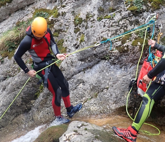  Enjoying the rappelling of the initiation ravine 