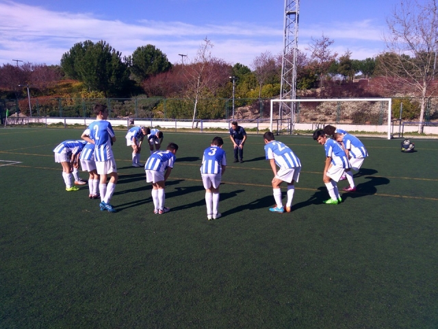 Alumnos calentando