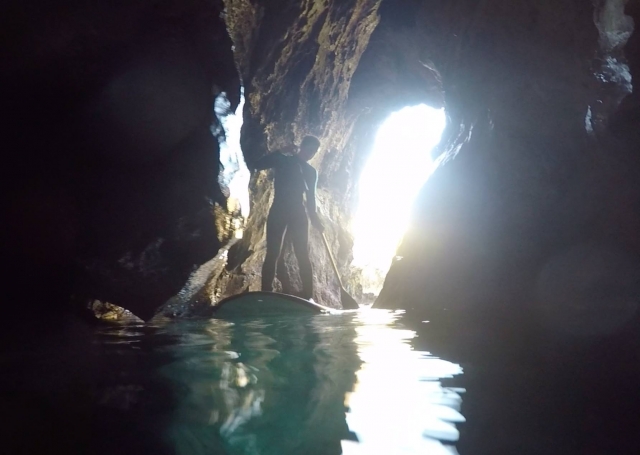  Paddle on the board and discover the hidden caves