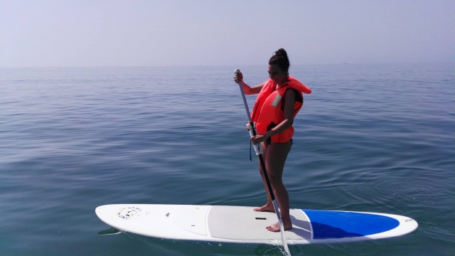  On the board and with the paddle 