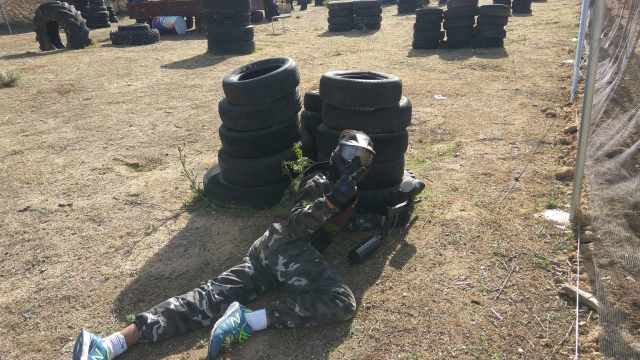  Aiming at a friend with the paintball marker 