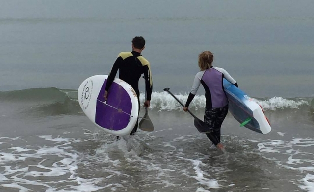  Getting into the sea with the boards 