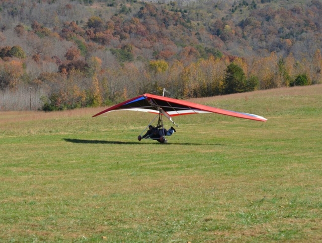  Hang glider landing with passenger