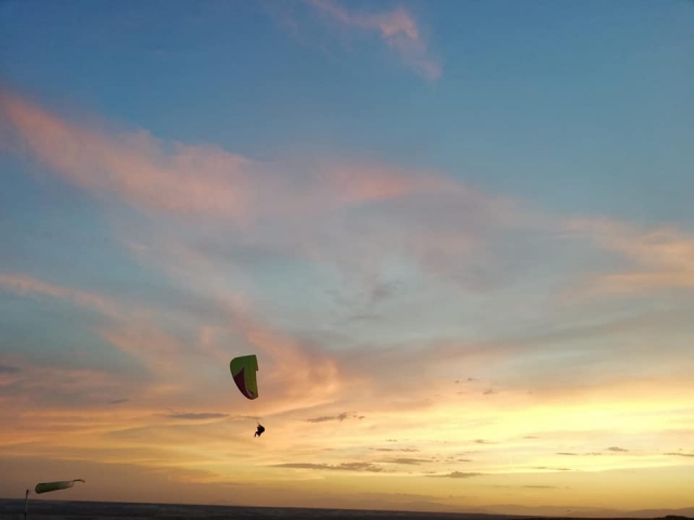 Paragliding flight at sunset over Madrid 