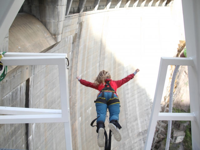  Girl jumping from the dam 