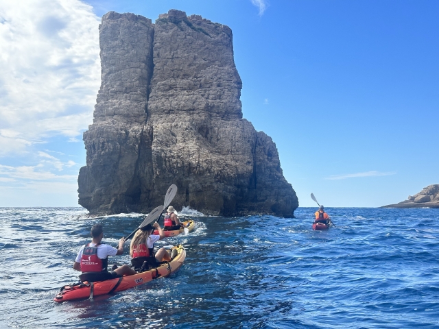  Group of family members on board a kayak 