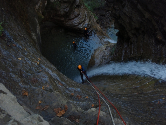 Rappelling during canyoning 